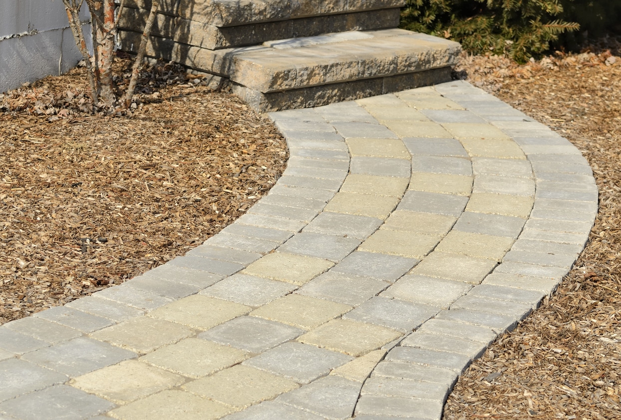 A professional landscaping job with stone path and stone steps.