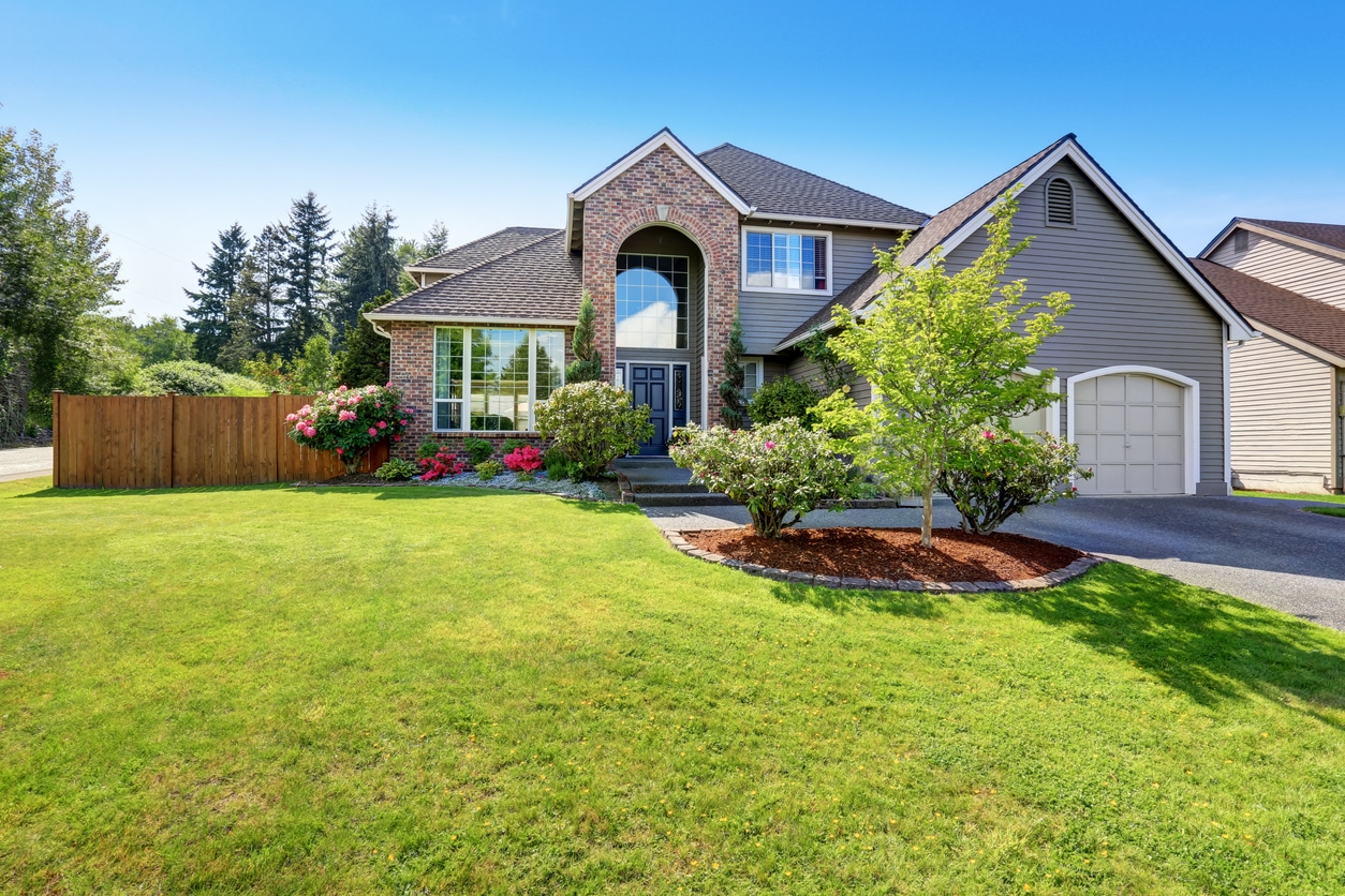 Luxury house exterior with double garage.